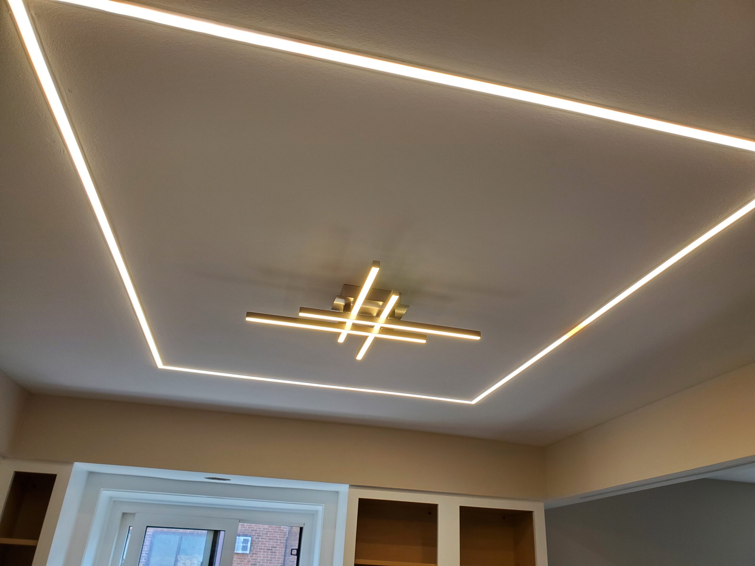 High-end architectural ceiling layout, delivering seamless, shadowless illumination across the room.